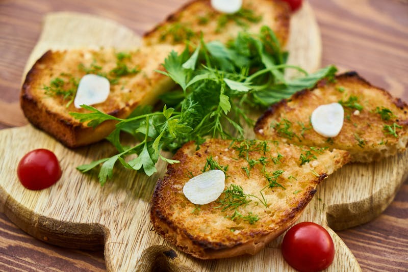 toasts with fresh parsley and garlic