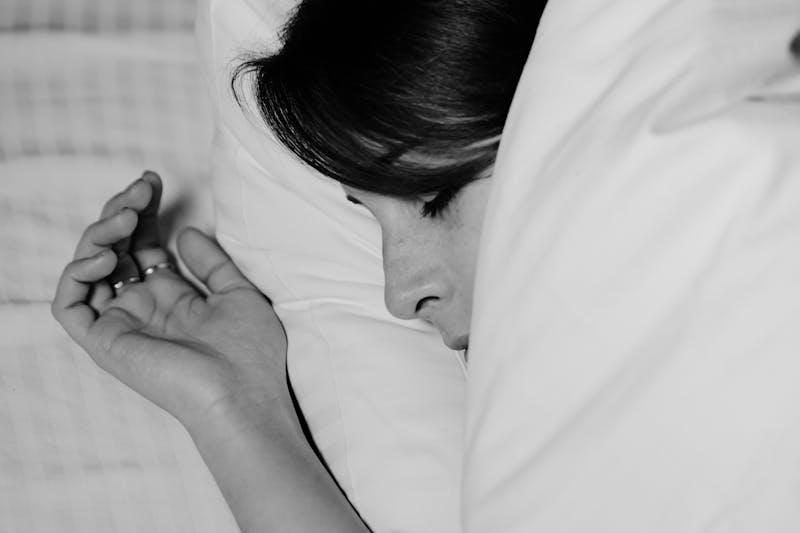 woman sleeps well after drinking lemon balm tea