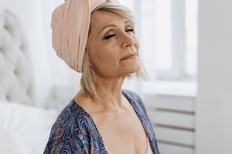 woman experiencing hot flashes during menopause garlic natural support