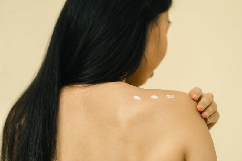 woman's back lubricated