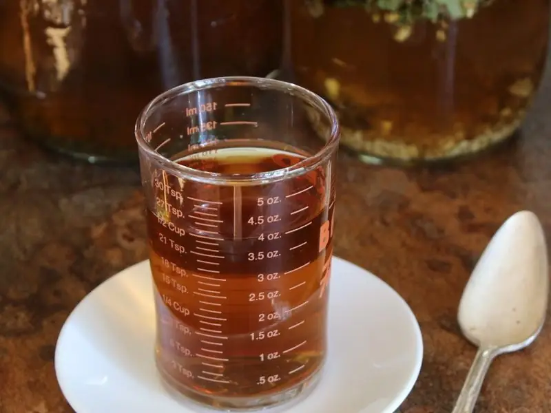 a glass of lemon balm and valerian tea